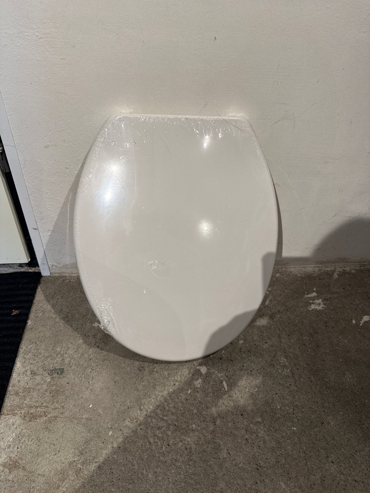Nieuwe wc bril in folie, Ophalen, Nieuw, Toilet