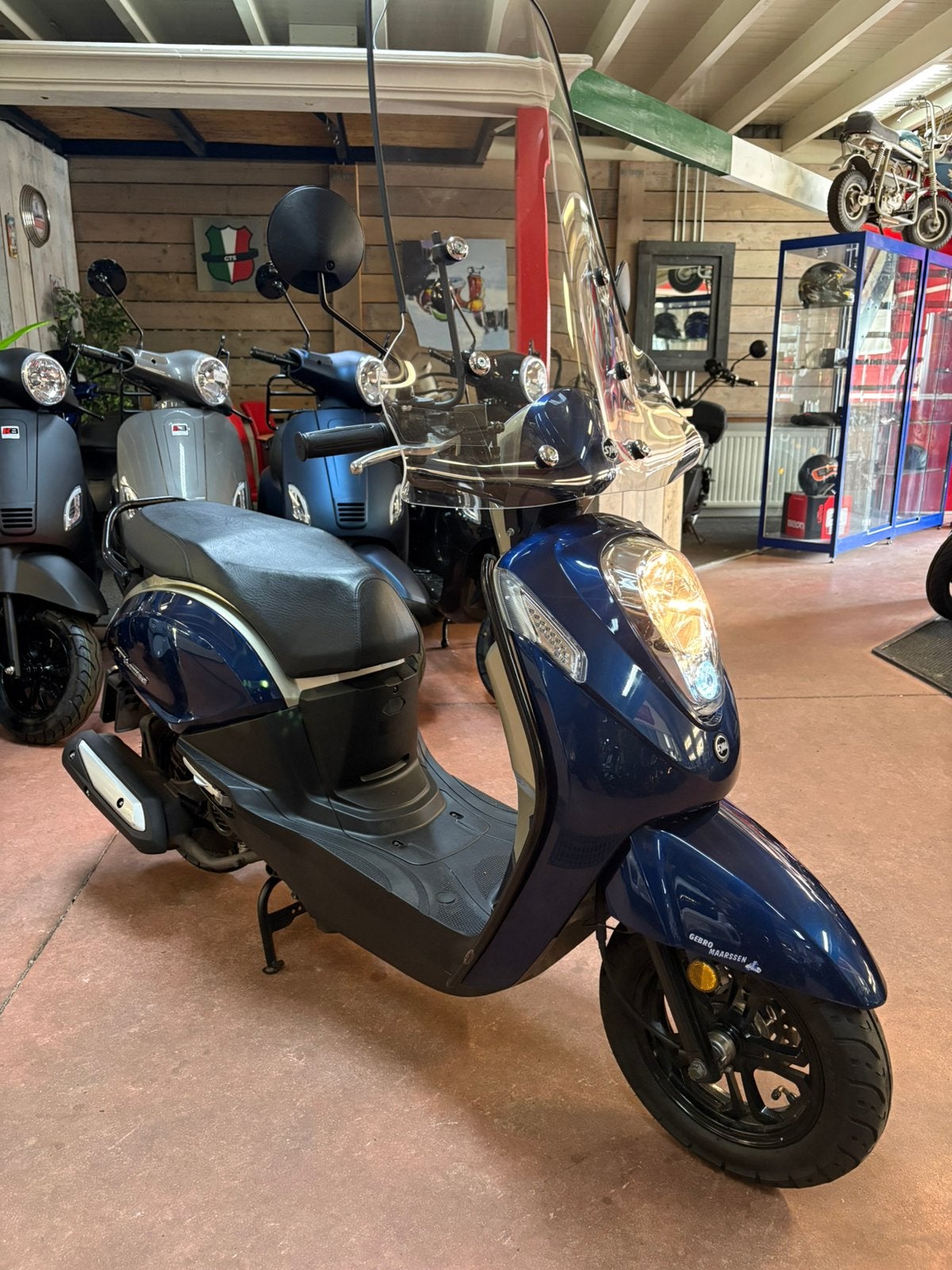 Gebro scooters: Sym mio i 25KM SNOR blauw BJ2020, Fietsen en Brommers, Scooters | SYM, Mio, Ophalen of Verzenden, Zo goed als nieuw
