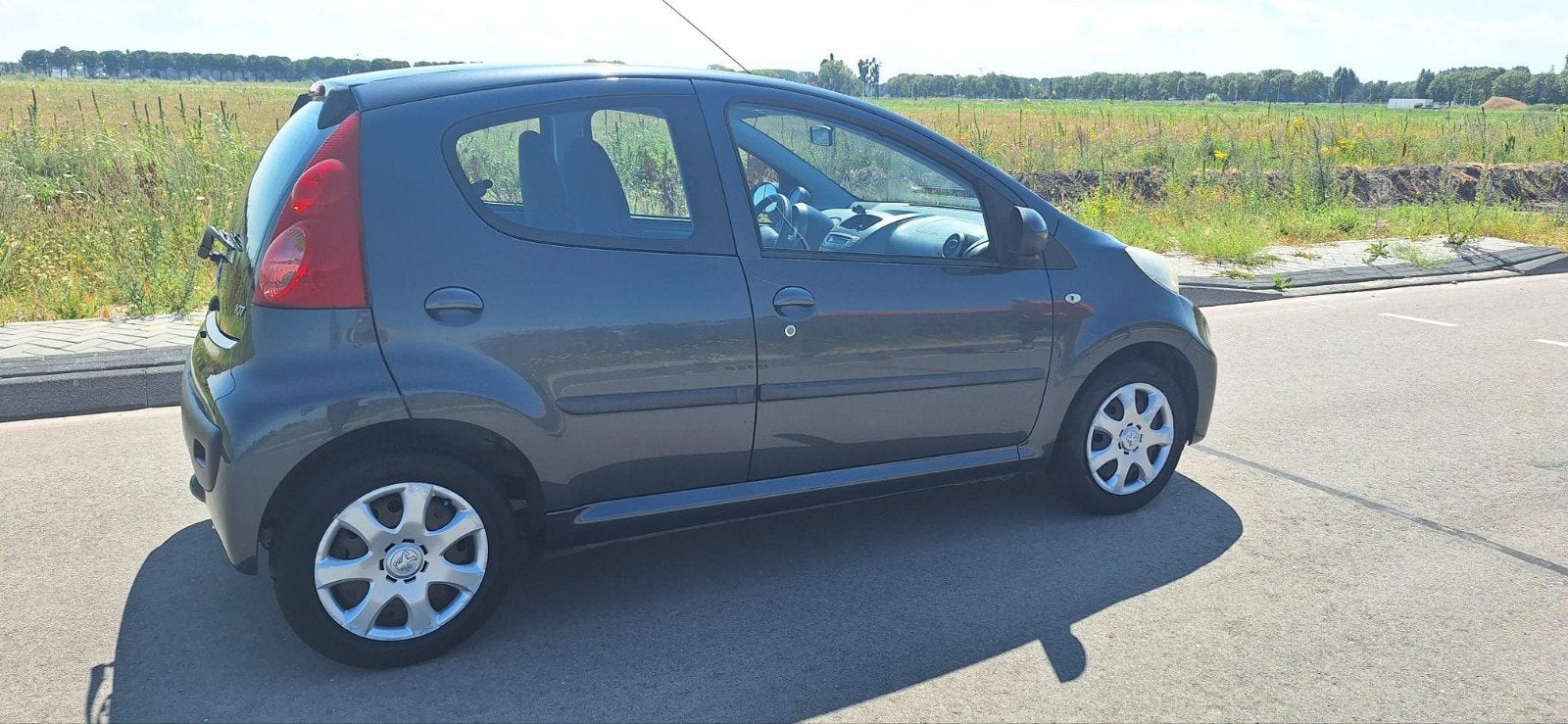 Peugeot 107 1.0 12V 5DR 2011 Grijs, Auto's, Voorwielaandrijving, 4 stoelen, 68 pk, Origineel Nederlands