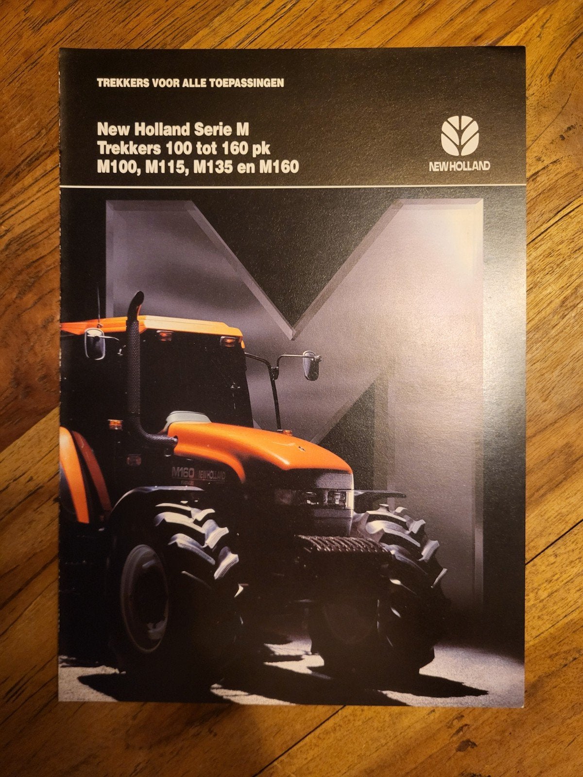 tractor folder New Holland Serie M, Boeken, Ophalen of Verzenden, Zo goed als nieuw