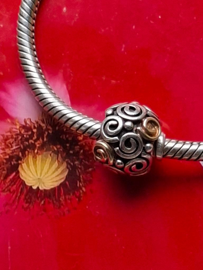 Pandora swirl zilver / goud. COLLECTORS ITEM, Pandora, Ophalen of Verzenden, Zo goed als nieuw, 1 bedel
