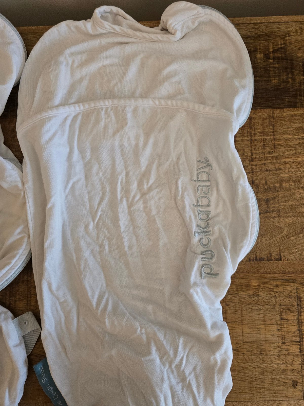 2 splinternieuwe Puckababy inbakerslaapzakken, Ophalen of Verzenden, Nieuw, Bakerzak of Bakerdoek