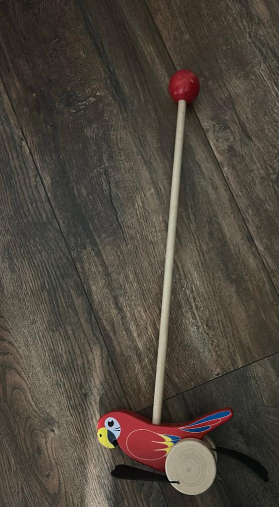 Houten papegaai speelgoed, Ophalen