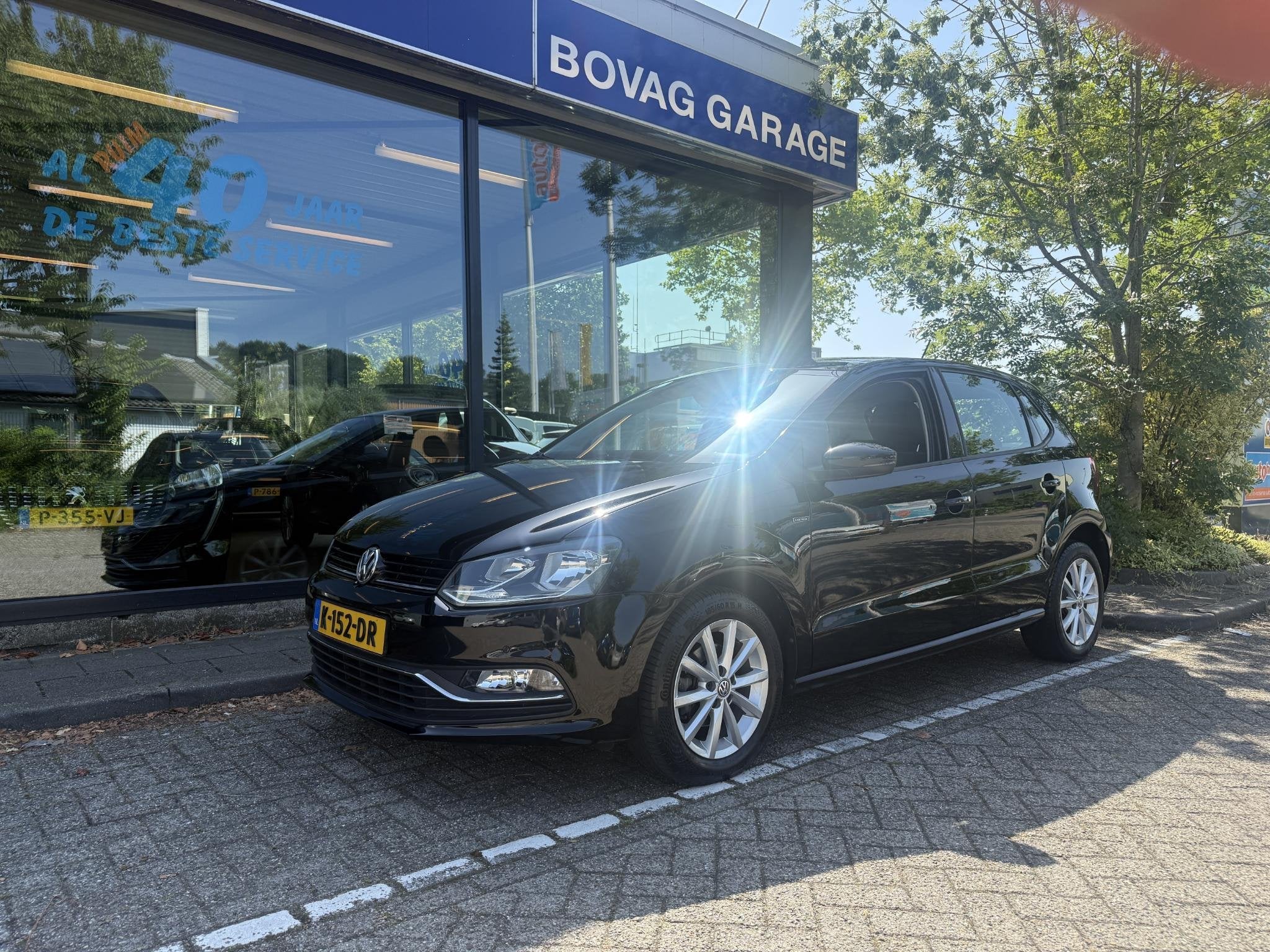 Volkswagen Polo 1.2 TSI Highline, Auto's, 12 maanden, Stof, 1039 kg, Zwart