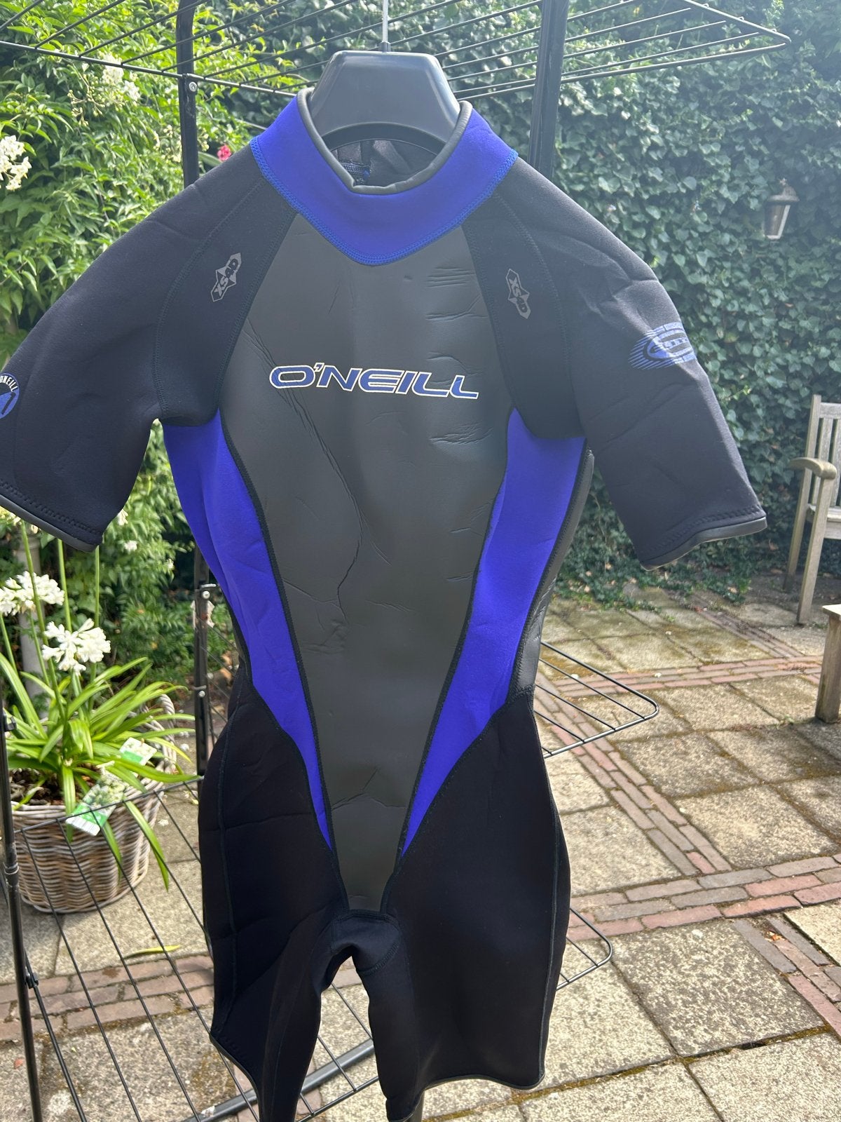 O'Neill shorty wetsuit - Maat 10 - Zwart/Blauw, Ophalen of Verzenden, Gebruikt, Dame, Wetsuit