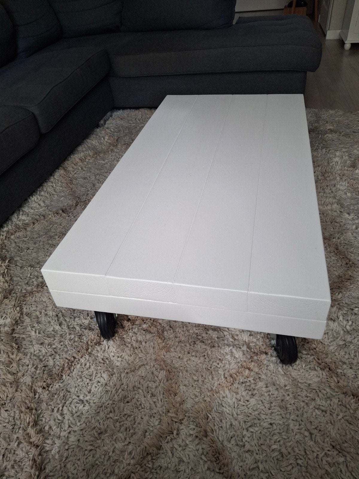 Witte salontafel op wieltjes, Ophalen, Gebruikt, 100 tot 150 cm, 50 tot 100 cm