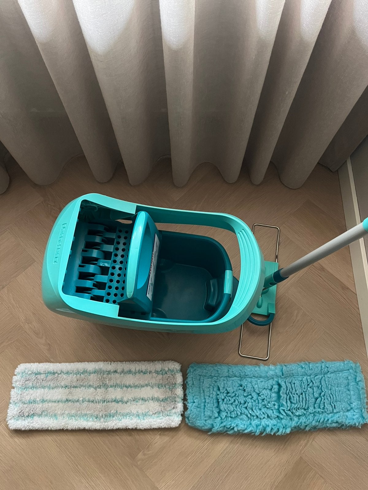 Dweil, Ophalen, Mop of Dweil