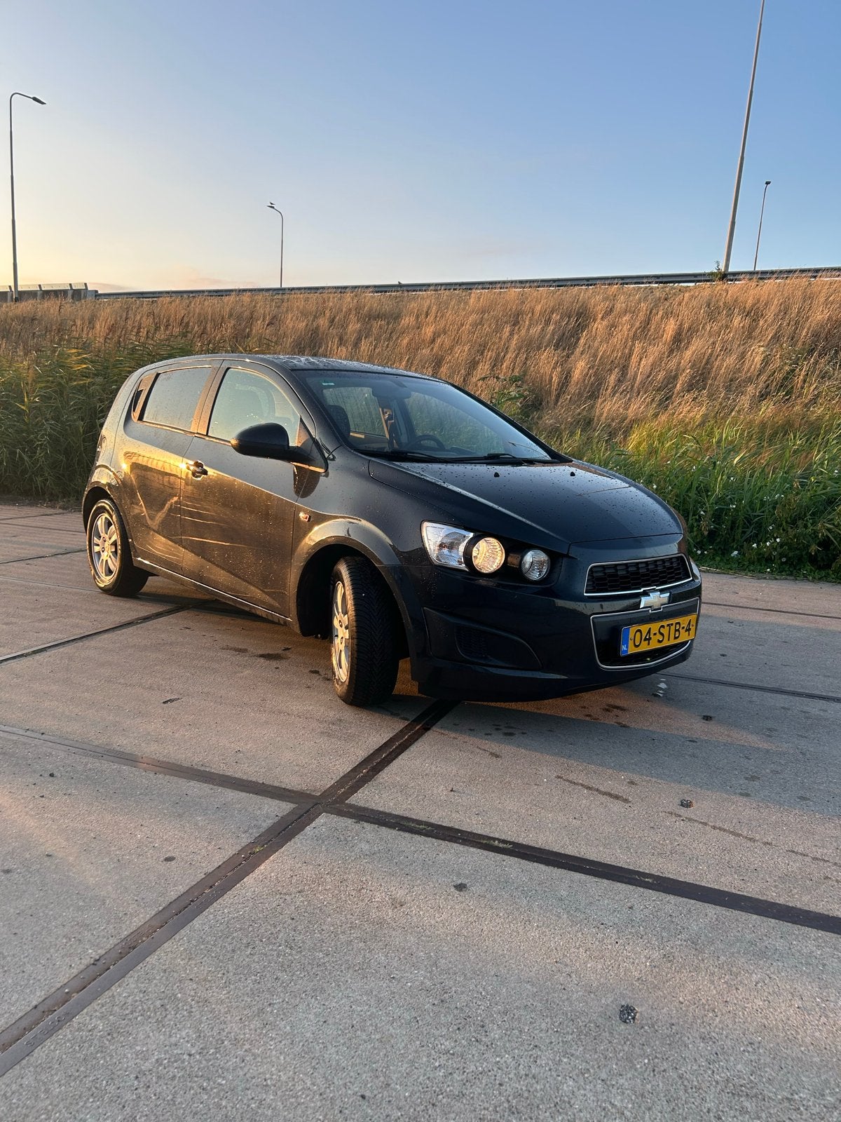 Chevrolet Aveo 1.4 5D 2011 Zwart, Auto's, Voorwielaandrijving, Euro 5, 4 cilinders, Particulier