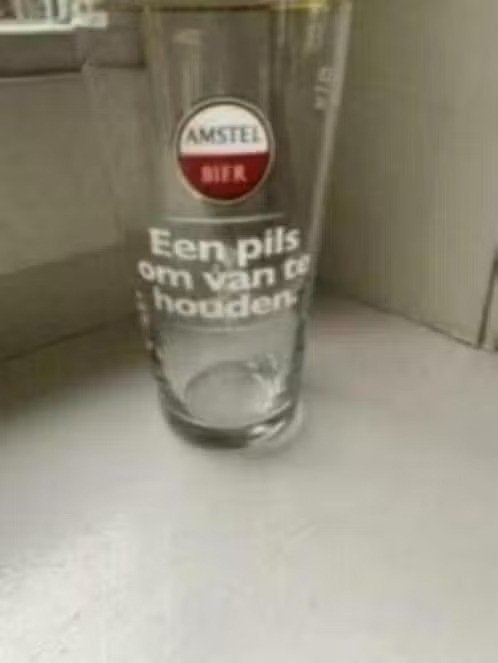 Glas Amstel bier. Een pils om van te houden, Verzamelen, Ophalen of Verzenden, Zo goed als nieuw, Glas of Glazen, Amstel