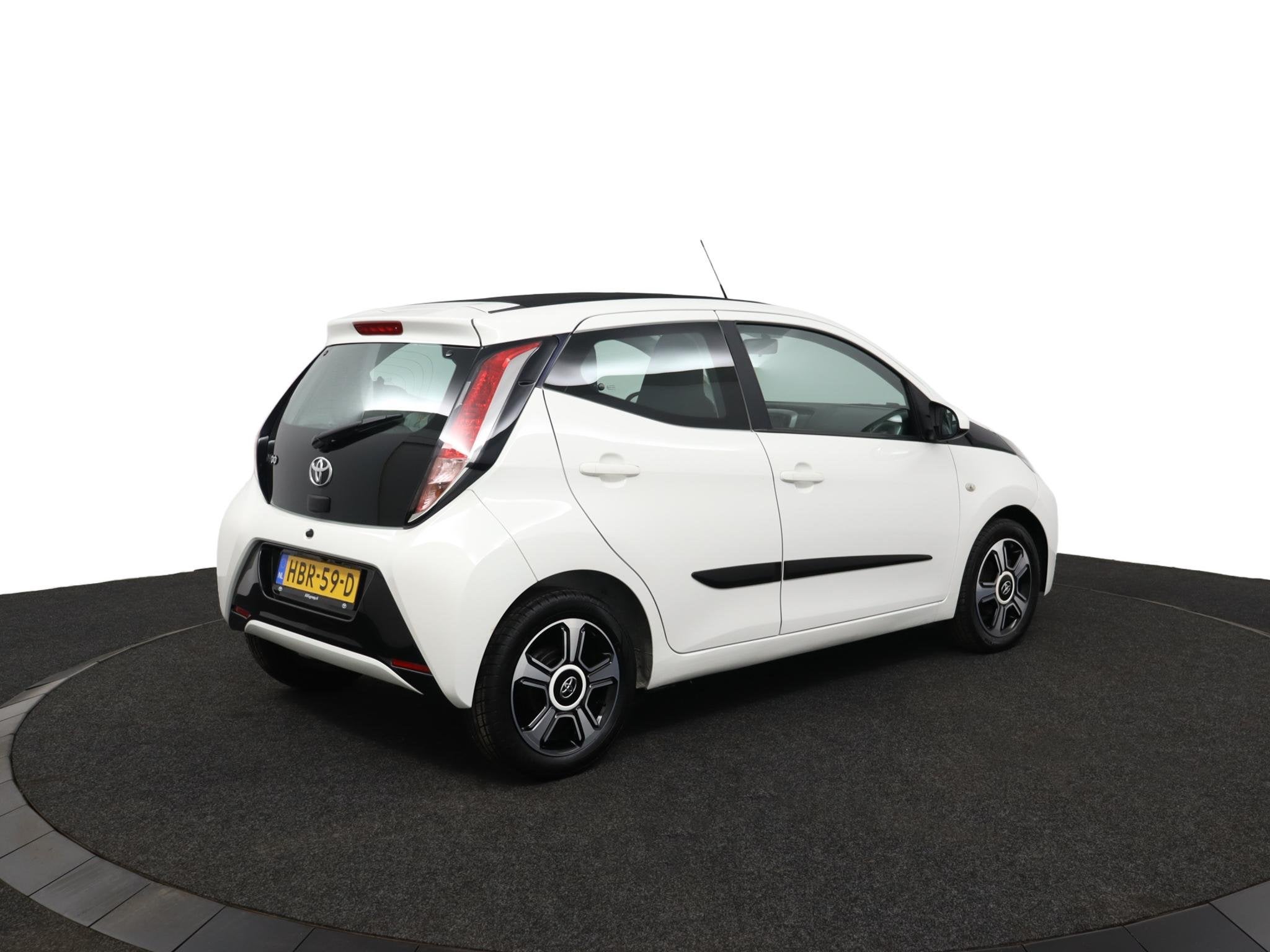 Toyota Aygo 1.0 VVT-i x-cite | Cabrio dak | Achteruitrijcame, Auto's, Toyota, 12 maanden, Stof, Gebruikt, 4 stoelen