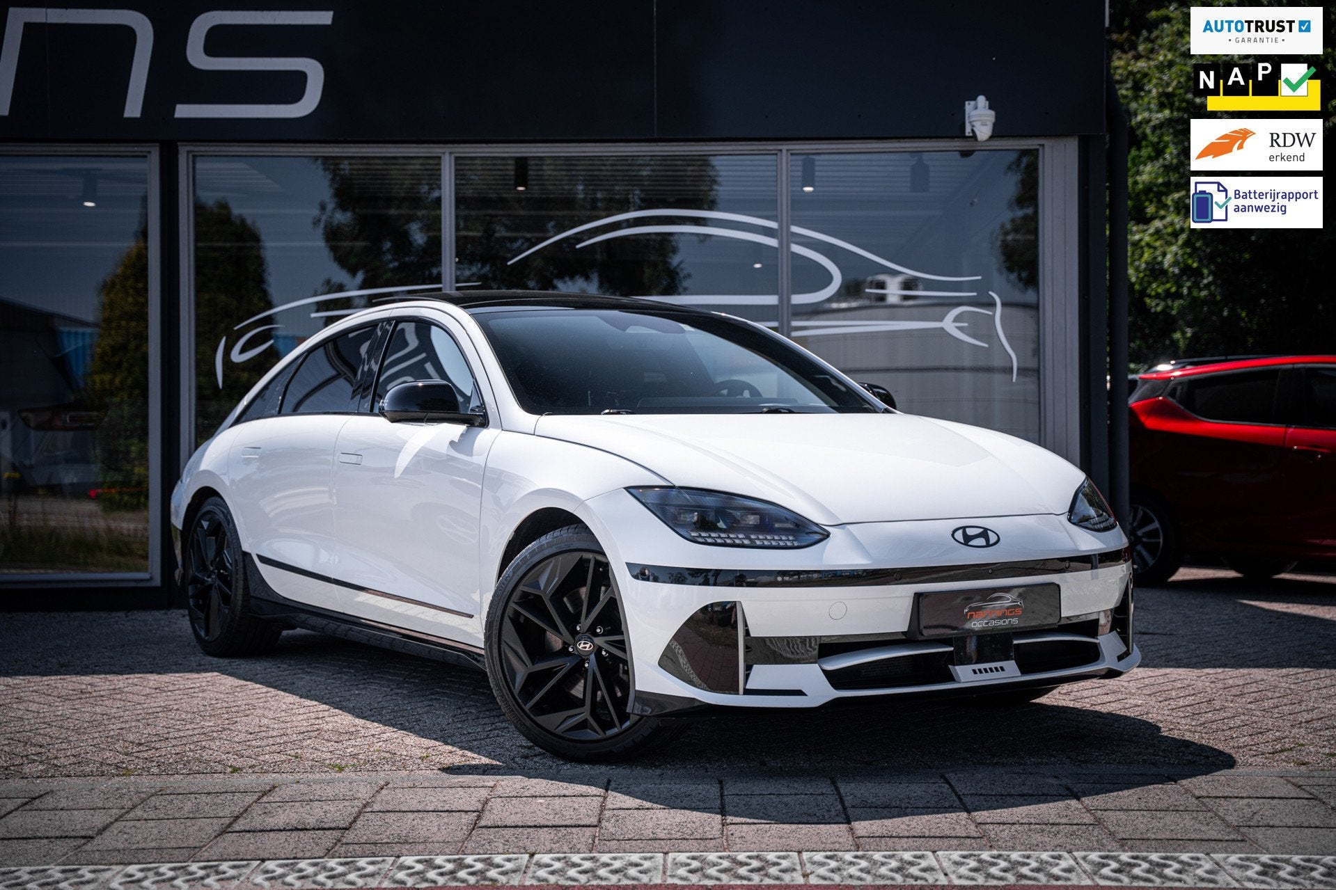Hyundai IONIQ 6 First Edition AWD 77.4 kWh|Pano|100% SOH|Sto, Auto's, Hyundai, Dealer onderhouden, Gebruikt, Zwart, Leder en Stof