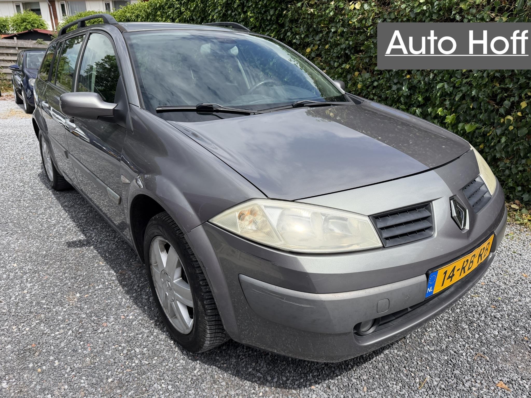 Renault Mégane Grand Tour 1.6-16V Privilège Luxe | Autom., Auto's, Renault, Stof, Gebruikt, 4 cilinders, Metallic lak