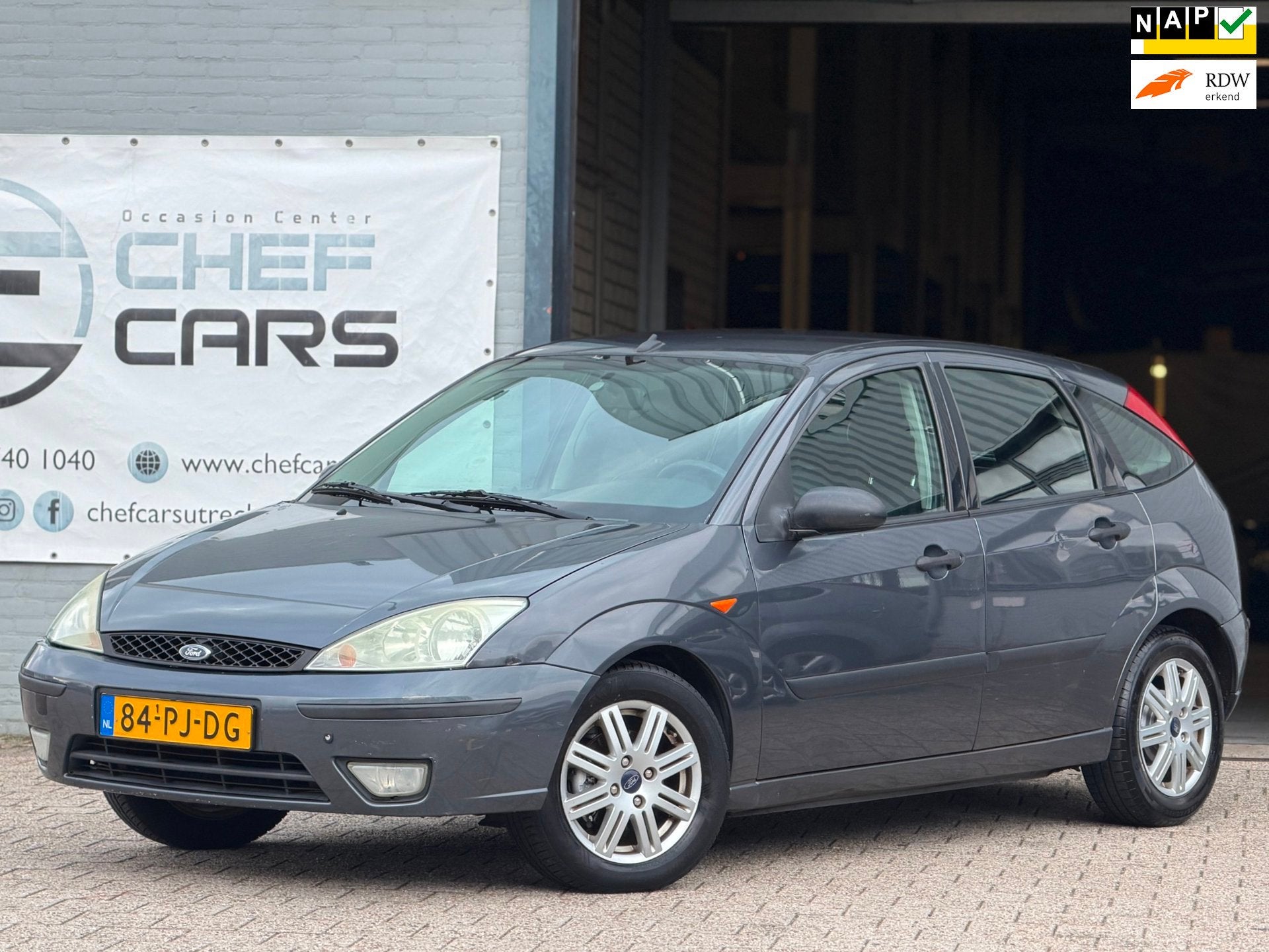 Ford Focus 1.6|NAP|AIRCO|LEER|DISTRIBUTIEVV|5DEURS|TREKHAAK!, Auto's, 1596 cc, Gebruikt, Zwart, 4 cilinders