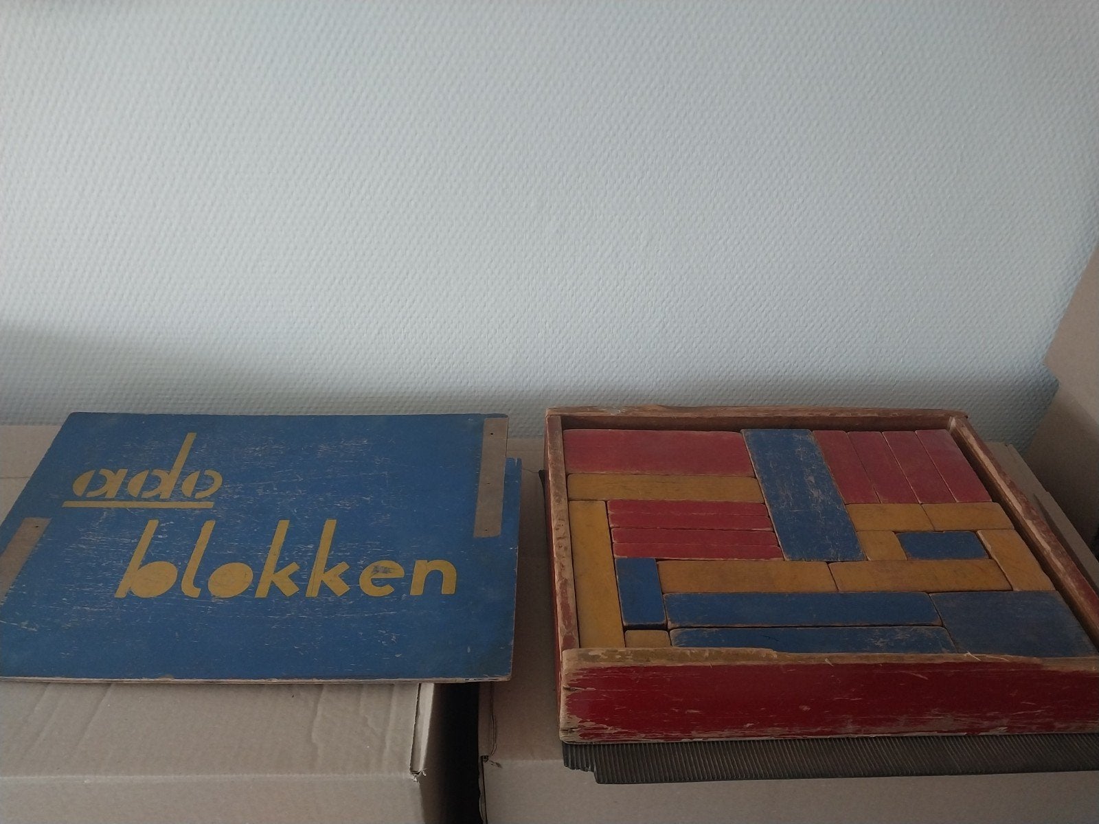 Klassiek ADO speelgoed bouwdoos, Ophalen