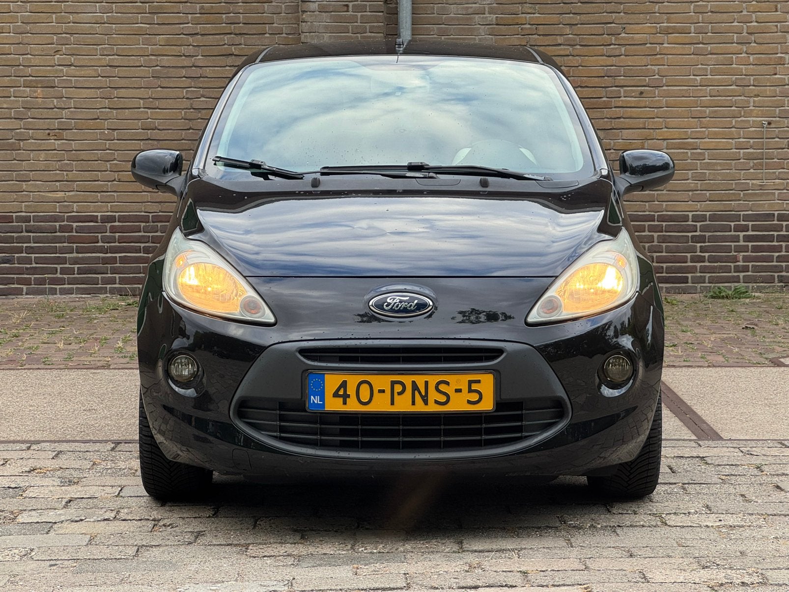 Ford Ka 1.2 69pk 2011 Zwart Titanium., Auto's, Voorwielaandrijving, Stof, 4 cilinders, 4 stoelen