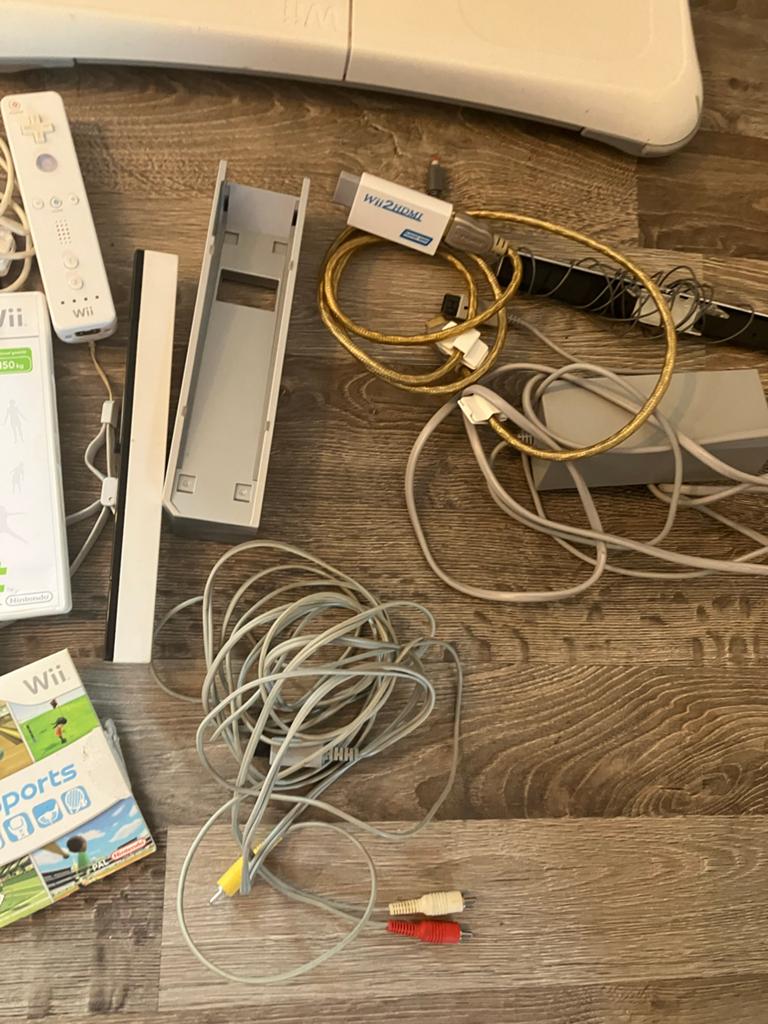 Wii console met Balance Board, controllers en games, Ophalen of Verzenden, Zo goed als nieuw, Met 1 controller, Met games