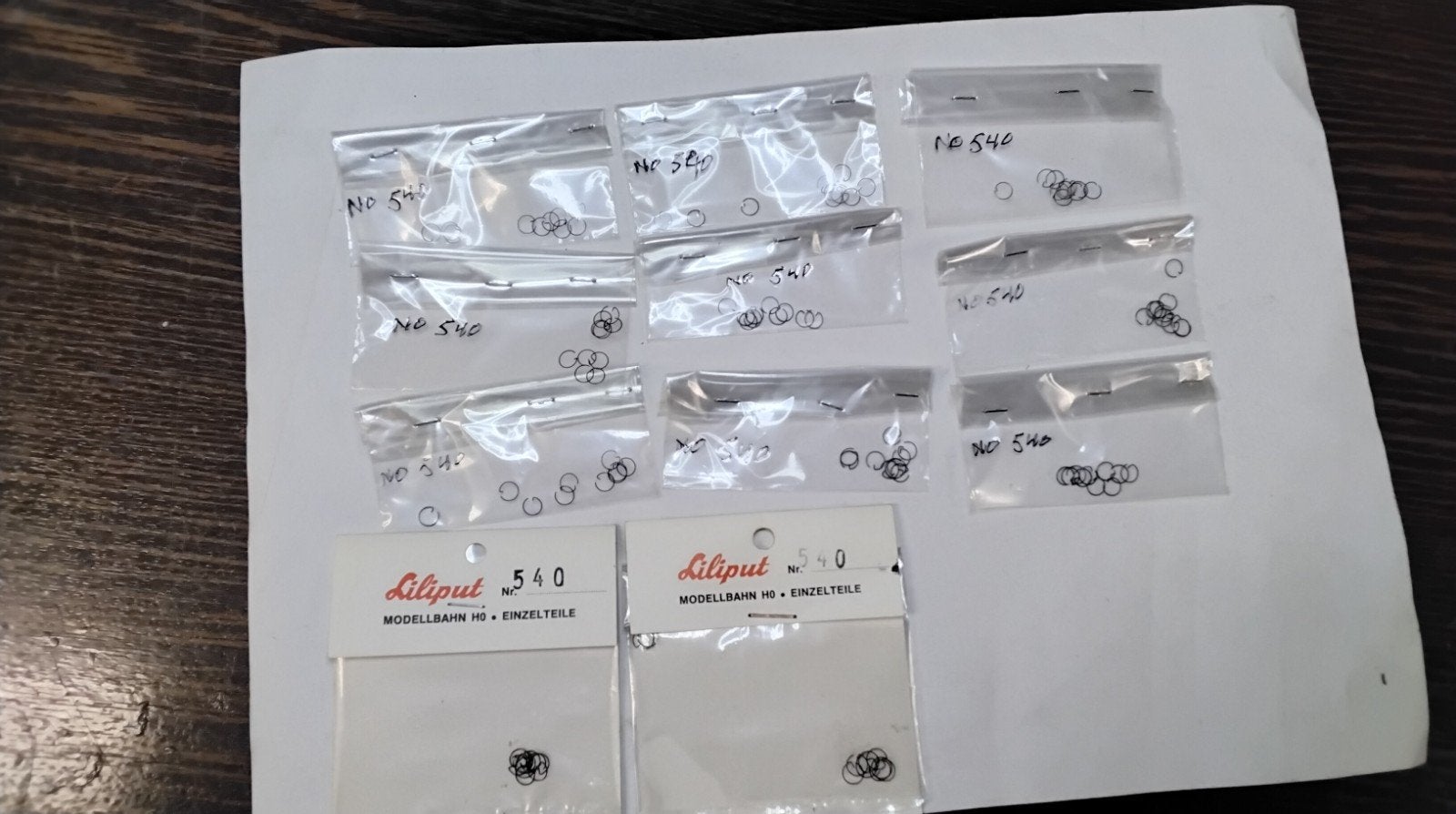 Liliput no 540 koppeling veerring 10 stuk in een zakje 6 eur, Hobby en Vrije tijd, Modeltreinen | H0, Gelijkstroom of Wisselstroom