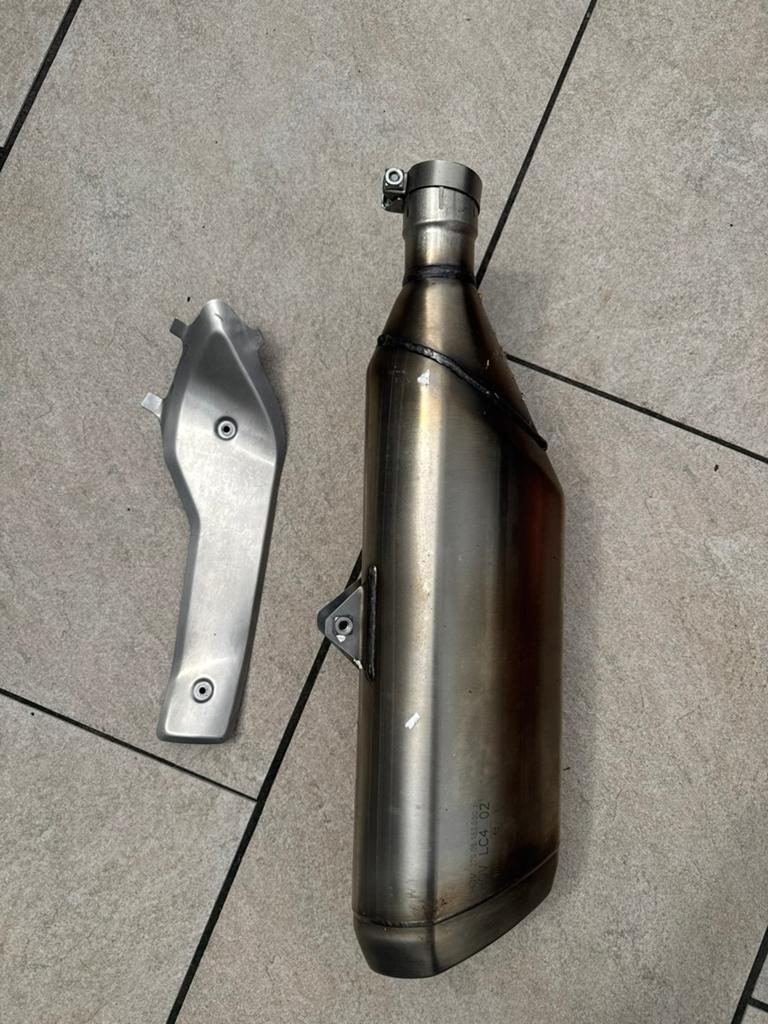Husqvarna 701 - Originele uitlaat - goede staat, Motoren, Ophalen of Verzenden