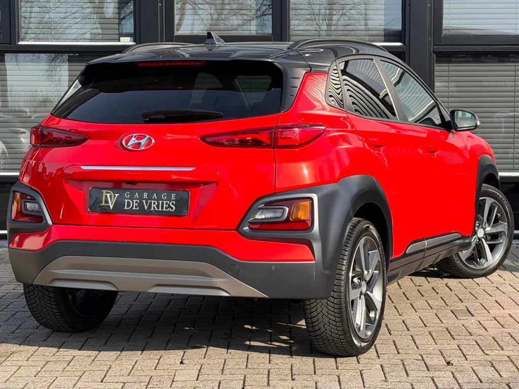 Hyundai Kona 1.0T Premium Full Option HUD Leder Camera Krell, Auto's, Hyundai, Voorwielaandrijving, Gebruikt, Zwart, Bedrijf