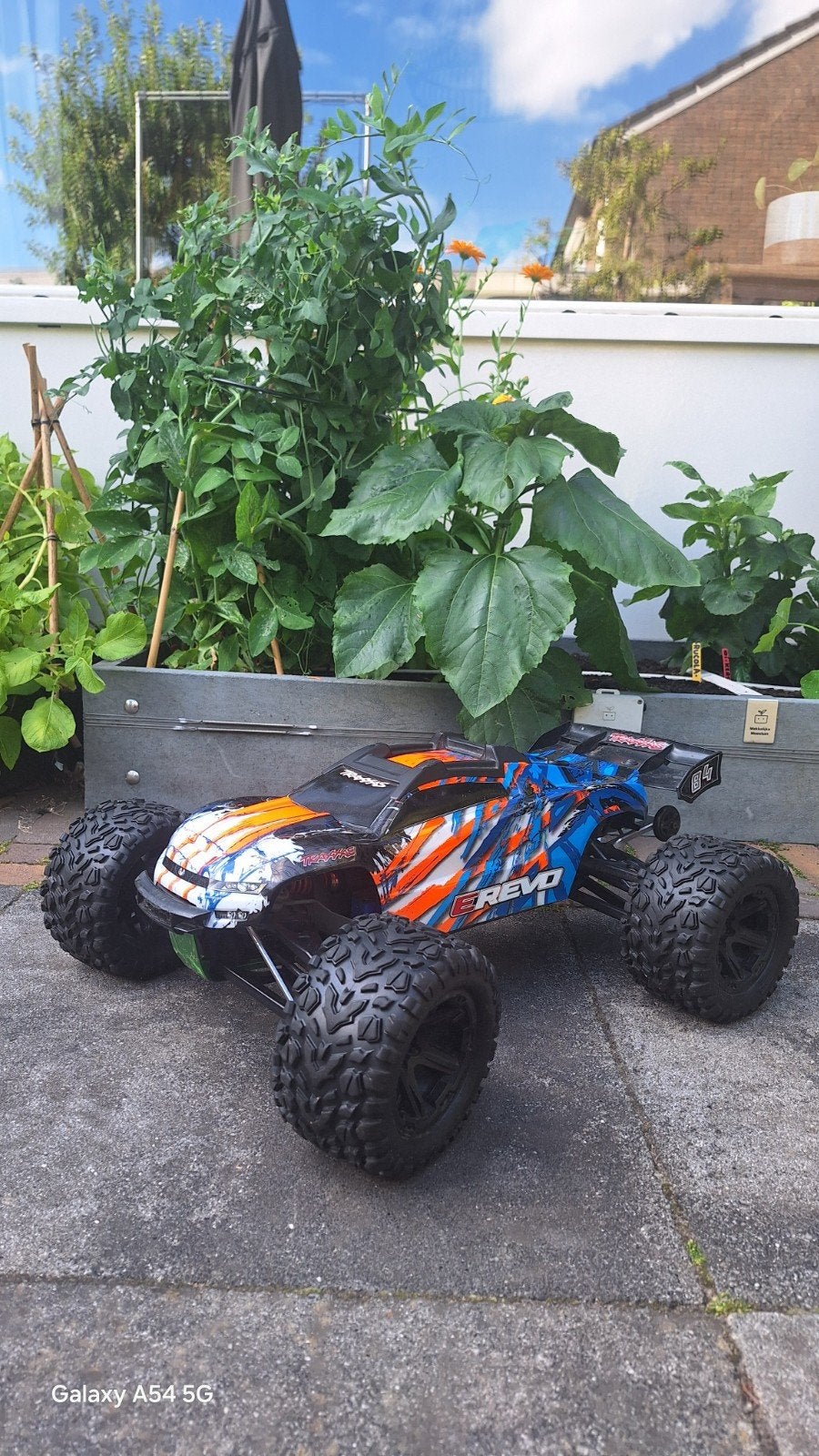 Traxxas E-Revo VXL 1:8 RC Auto - Zo goed als nieuw, Hobby en Vrije tijd, Modelbouw | Radiografisch | Auto's, Ophalen of Verzenden