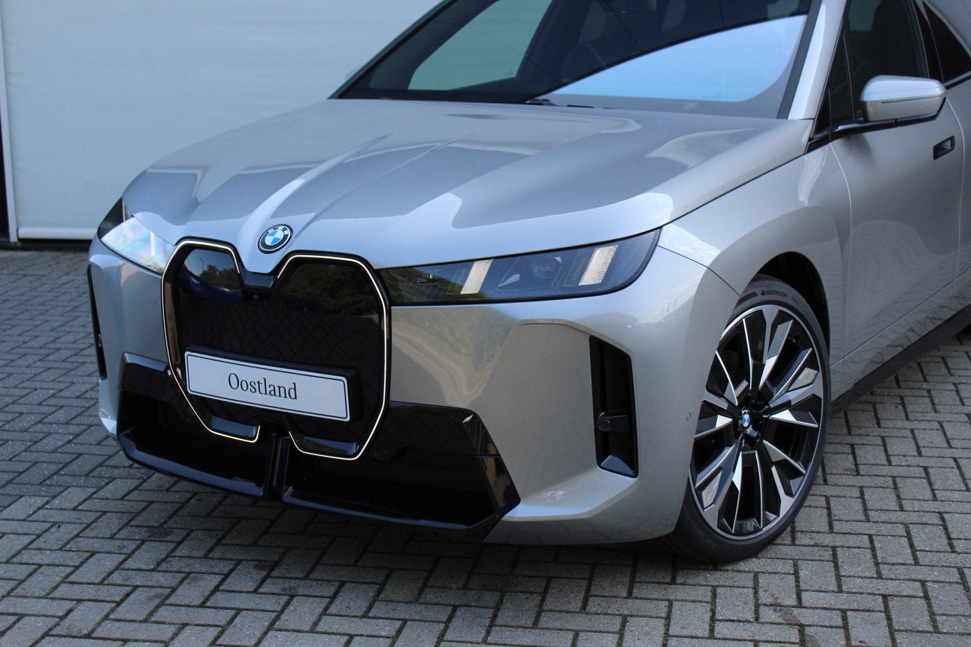 BMW iX xDrive45 M Sport / Trekhaak / Panoramadak Sky Lounge, Auto's, Automaat, Dealer onderhouden, Zwart, IX