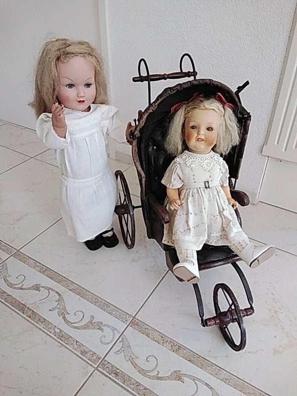 Vintage poppen en wagentje., Ophalen of Verzenden, Gebruikt, Pop