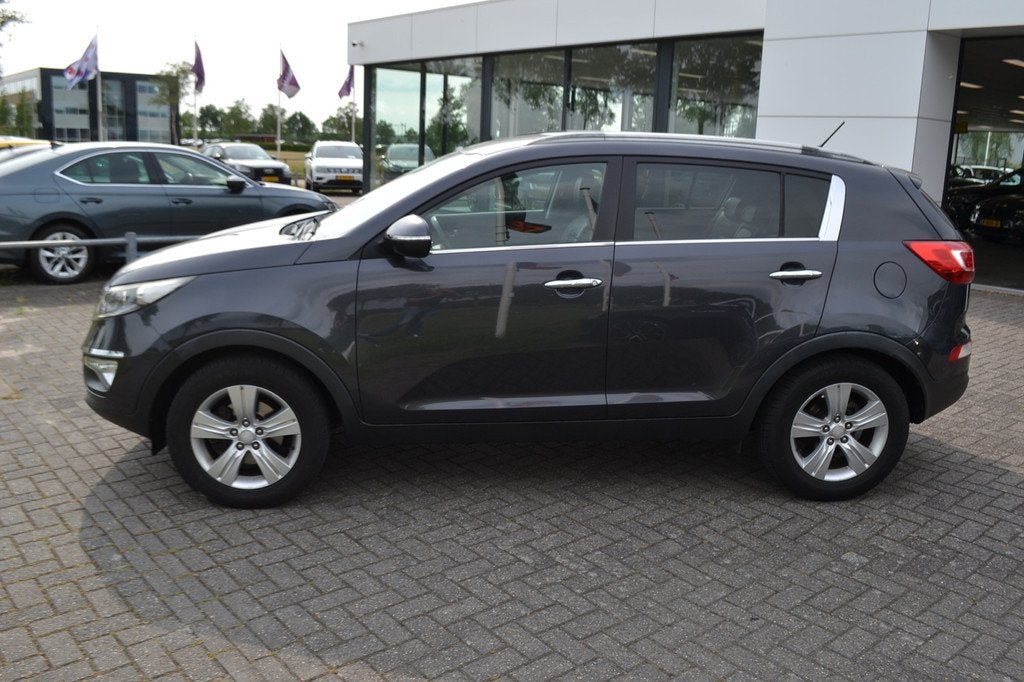Kia Sportage 2.0 X-ecutive Plus Pack (bj 2011), Auto's, Kia, Gebruikt, Zwart, 4 cilinders, Leder en Stof