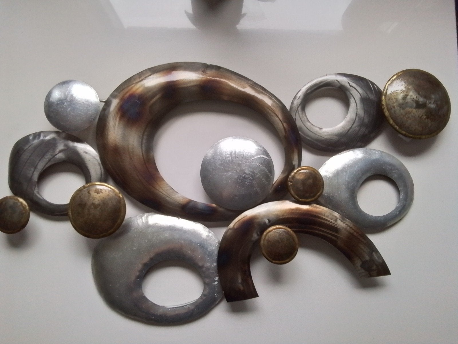 Metalen wanddecoratie 70x40 cm - Modern design, Huis en Inrichting, Woonaccessoires | Wanddecoraties, Ophalen of Verzenden