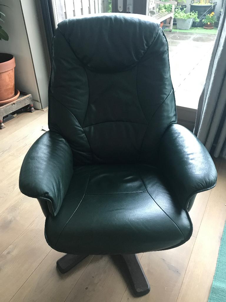 Donker groene leren draaifauteuil, Ophalen, Minder dan 75 cm, Zo goed als nieuw, Leer