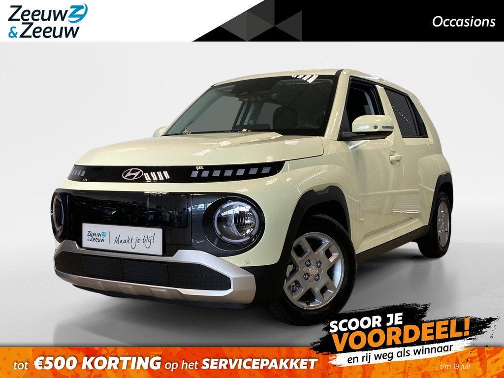Hyundai INSTER 49 KWH | PULSE | AIRCO | NAVI |, Auto's, Hyundai, 12 maanden, Stof, Zwart, Geel