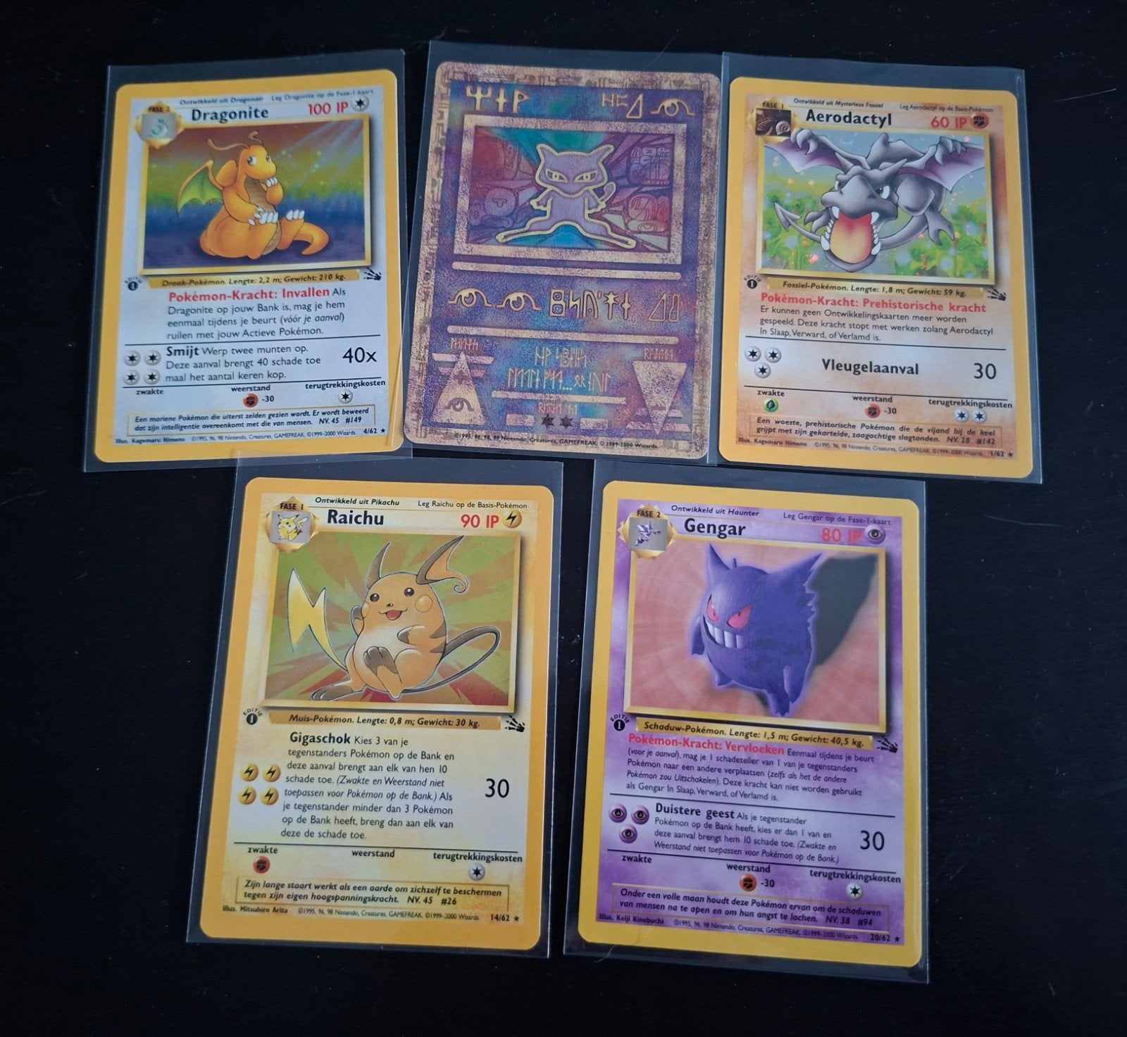 Oude Pokémon kaarten (Nederlands, 1st edition) + Ancient Mew, Ophalen of Verzenden, Zo goed als nieuw, Meerdere kaarten, Foil