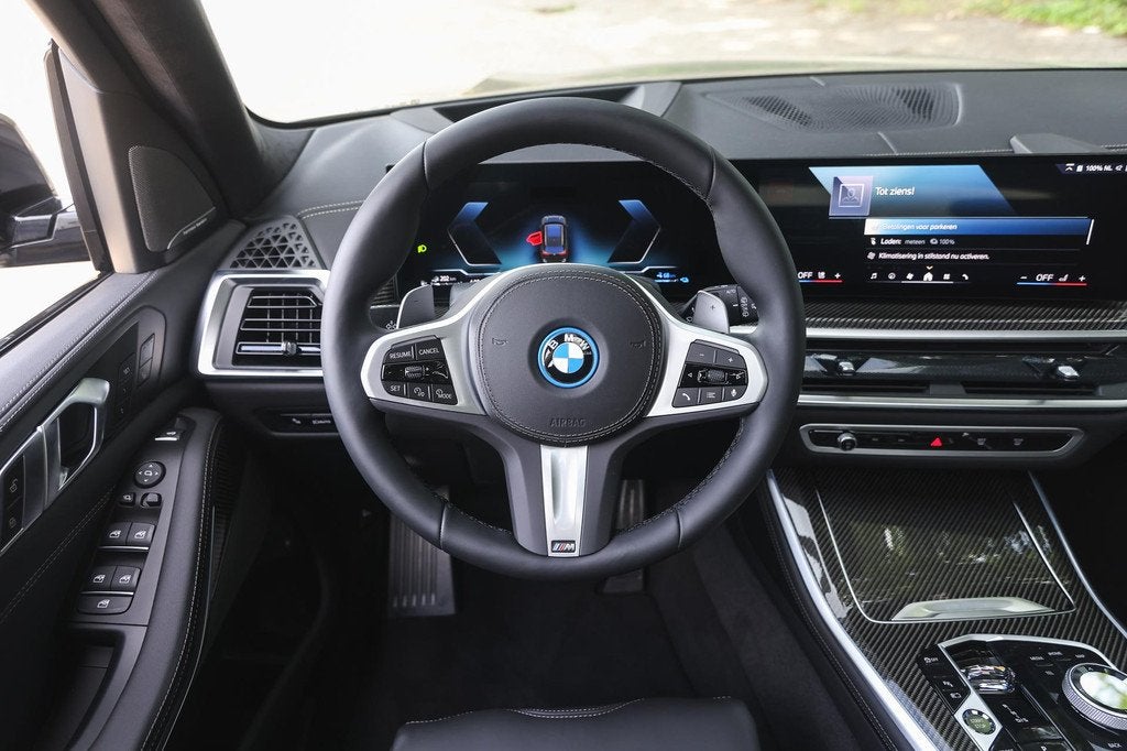 BMW X5 xDrive50e M Sport Automaat / Trekhaak / Panoramadak /, Auto's, Automaat, 2395 kg, Leder, Bedrijf