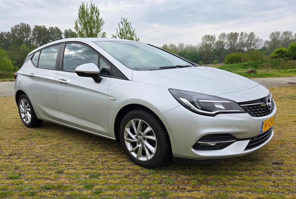 Opel Astra 1.2 110pk Start/stop 2020 Grijs, Auto's, Opel, Voorwielaandrijving, Stof, 1199 cc, 620 kg