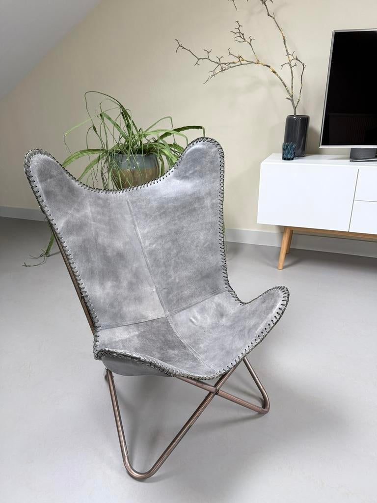 Malagoon leren vlinderstoel - vintage grey, Huis en Inrichting, Stoelen, Leer, Ophalen of Verzenden, Zo goed als nieuw, Eén