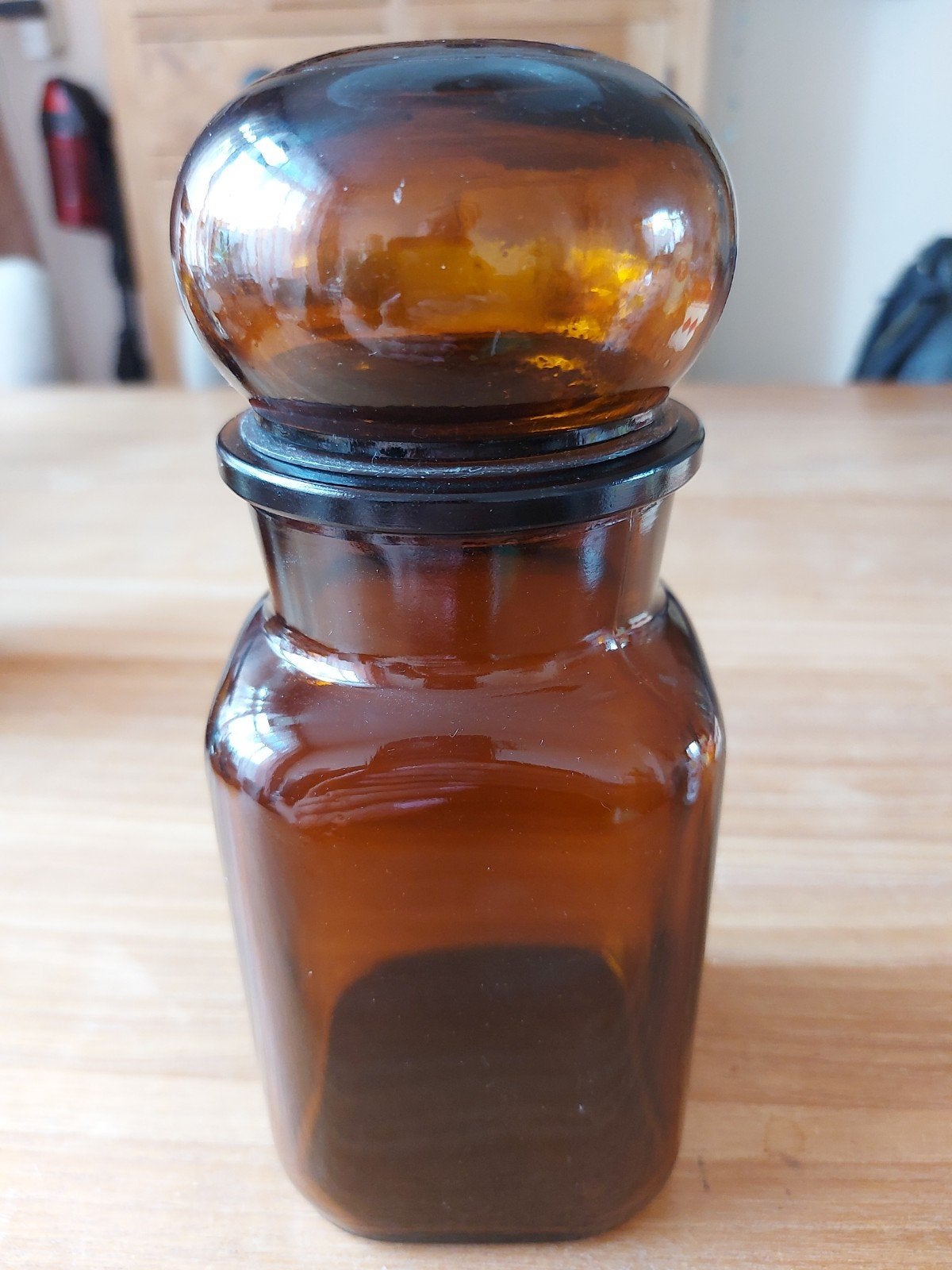 Vintage apothekerspot bruin amber glas en bolster 21 cm hoog, Ophalen of Verzenden, Overige typen