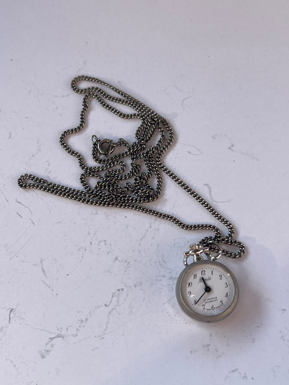 Mini zakhorloge met ketting Monte, Overige merken, Overige materialen, Zakhorloge, Gebruikt