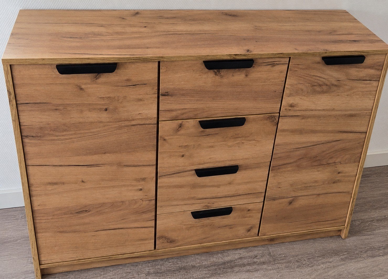 Dressoir JENSLEV 2 deuren 4 lades wild naturel eiken kleur, Ophalen, Zo goed als nieuw, 25 tot 50 cm, 100 tot 150 cm