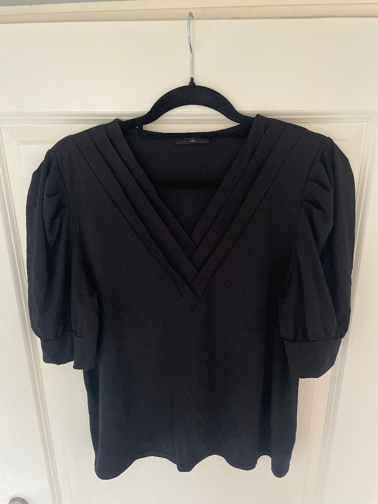 Travelstof dames shirt met pofmouwtje zwart (L/XL), Maat 42/44 (L), Ophalen of Verzenden, Zo goed als nieuw, Korte mouw