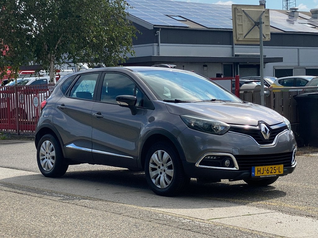 Renault Captur 0.9 TCE 90 2015 Grijs 111726 Km Nap Airco, Auto's, Voorwielaandrijving, 898 cc, 49 €/maand, Origineel Nederlands
