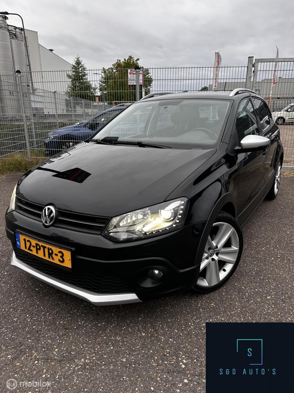 Volkswagen Polo 1.2 TSI Cross / Automaat / Zeer nette wagen., Auto's, Euro 5, Zwart, Origineel Nederlands, Parkeersensor