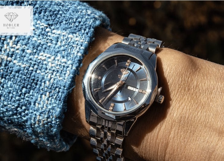 Nieuwe Hodler Geneve zilver - blauw t.w.v. € 399, Blauw, IOS, Nieuw, Ophalen of Verzenden