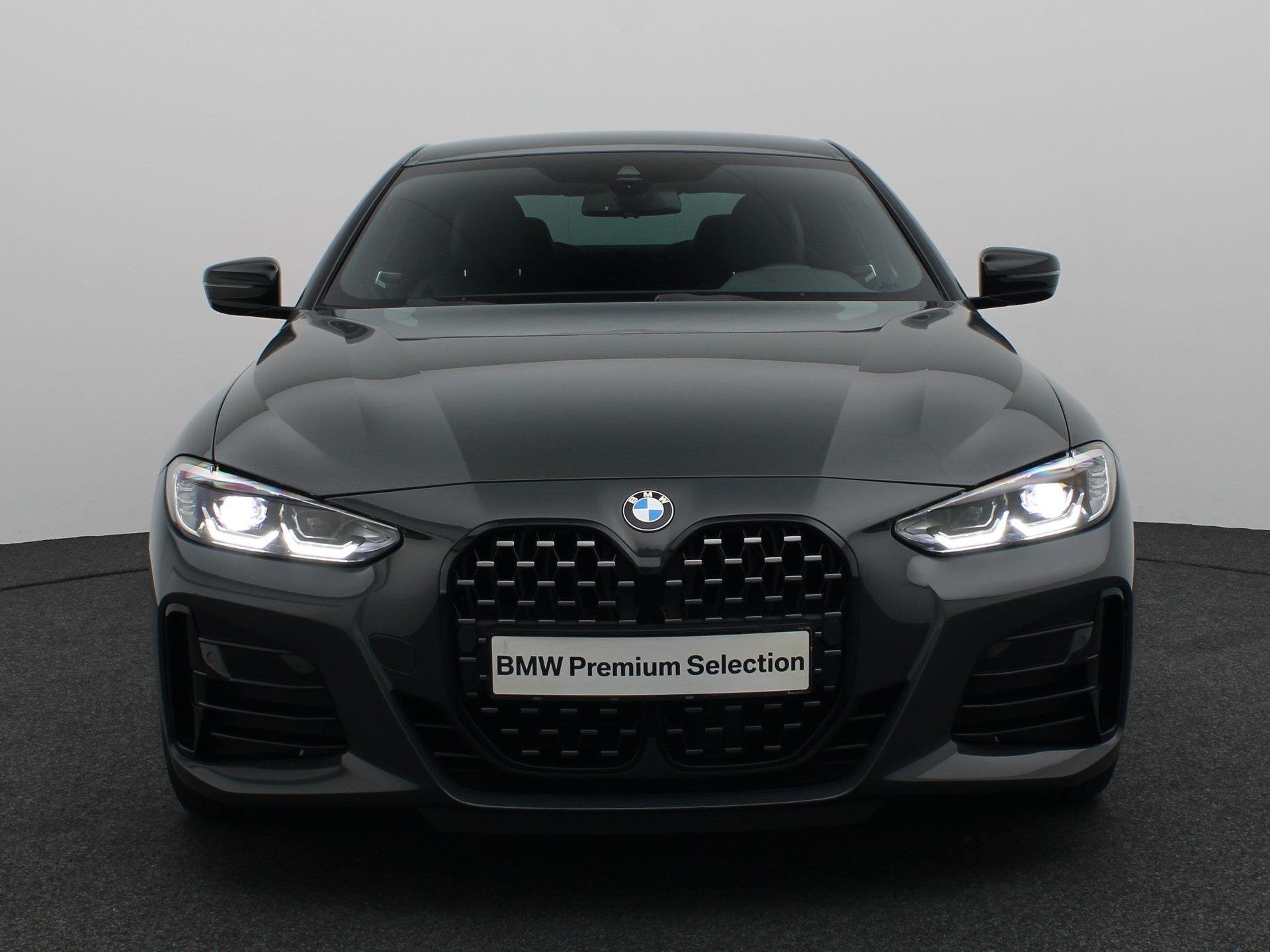 BMW 4 Serie Coupé M440i xDrive High Executive | Elektrisch, Auto's, Automaat, Stof, Met garantie (alle), 4 stoelen