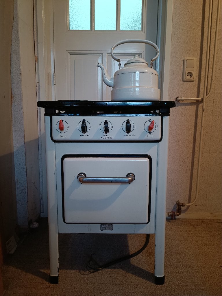antiek elektrisch fornuis met oven uit 1935, Ophalen