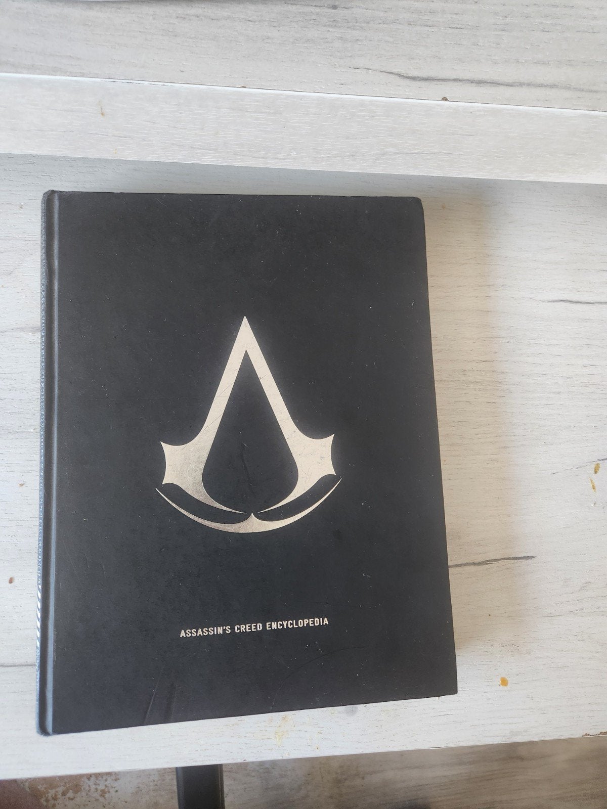 Assassin's Creed Encyclopedia - Zo goed als nieuw, Boeken, Ophalen of Verzenden, Zo goed als nieuw, Overige onderwerpen, Los deel