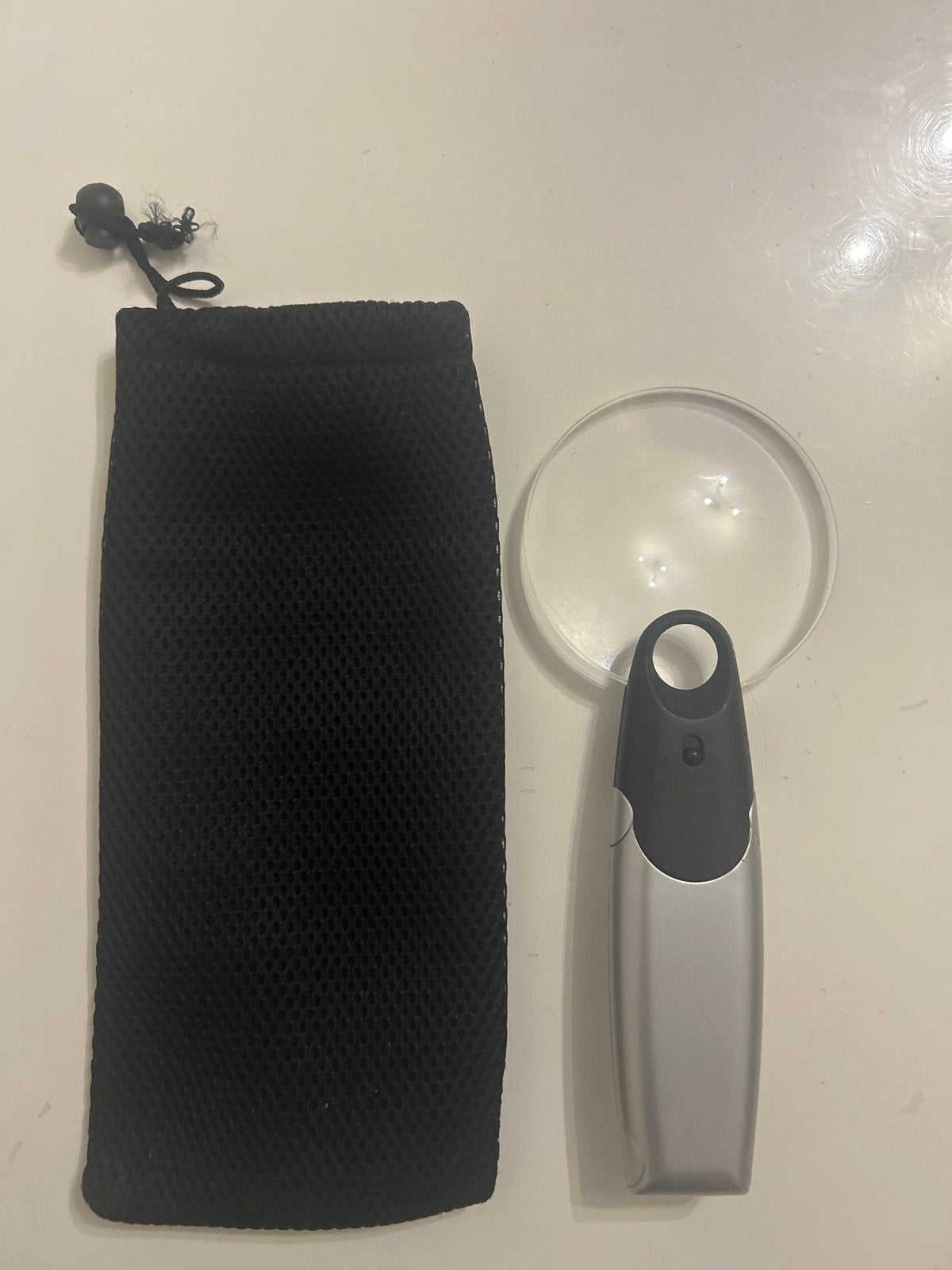 Vergrootglas met LED-verlichting en opbergzakje, Ophalen of Verzenden, Zo goed als nieuw, Vergrootglas of Loep