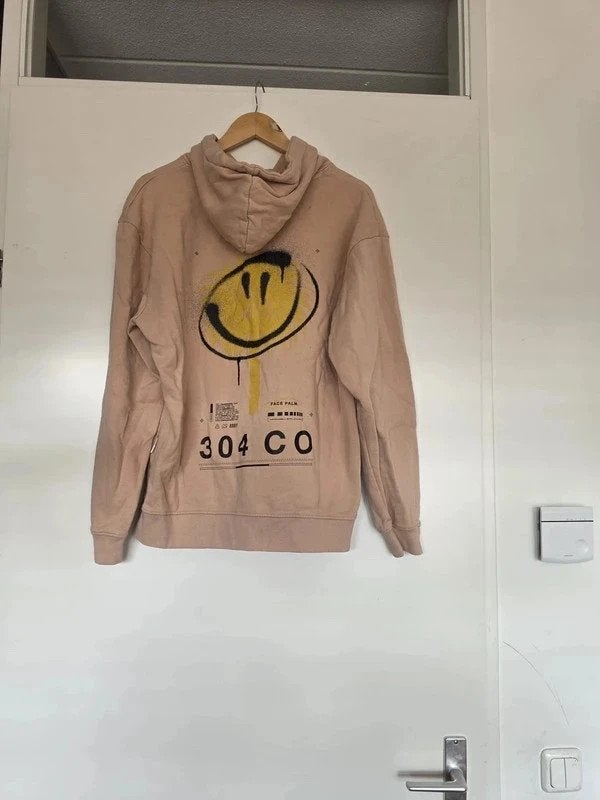 Roze hoodie met toffe smiley achterop maat L, Ophalen of Verzenden, Gedragen, Maat 52/54 (L), Oranje