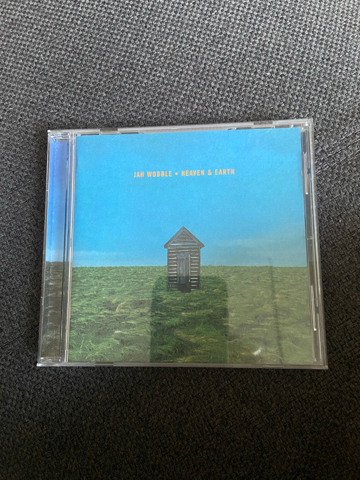 Jan Wobble: Heaven & Earth CD - Zo goed als nieuw, Ophalen of Verzenden, Zo goed als nieuw, Album, Inclusief boekje