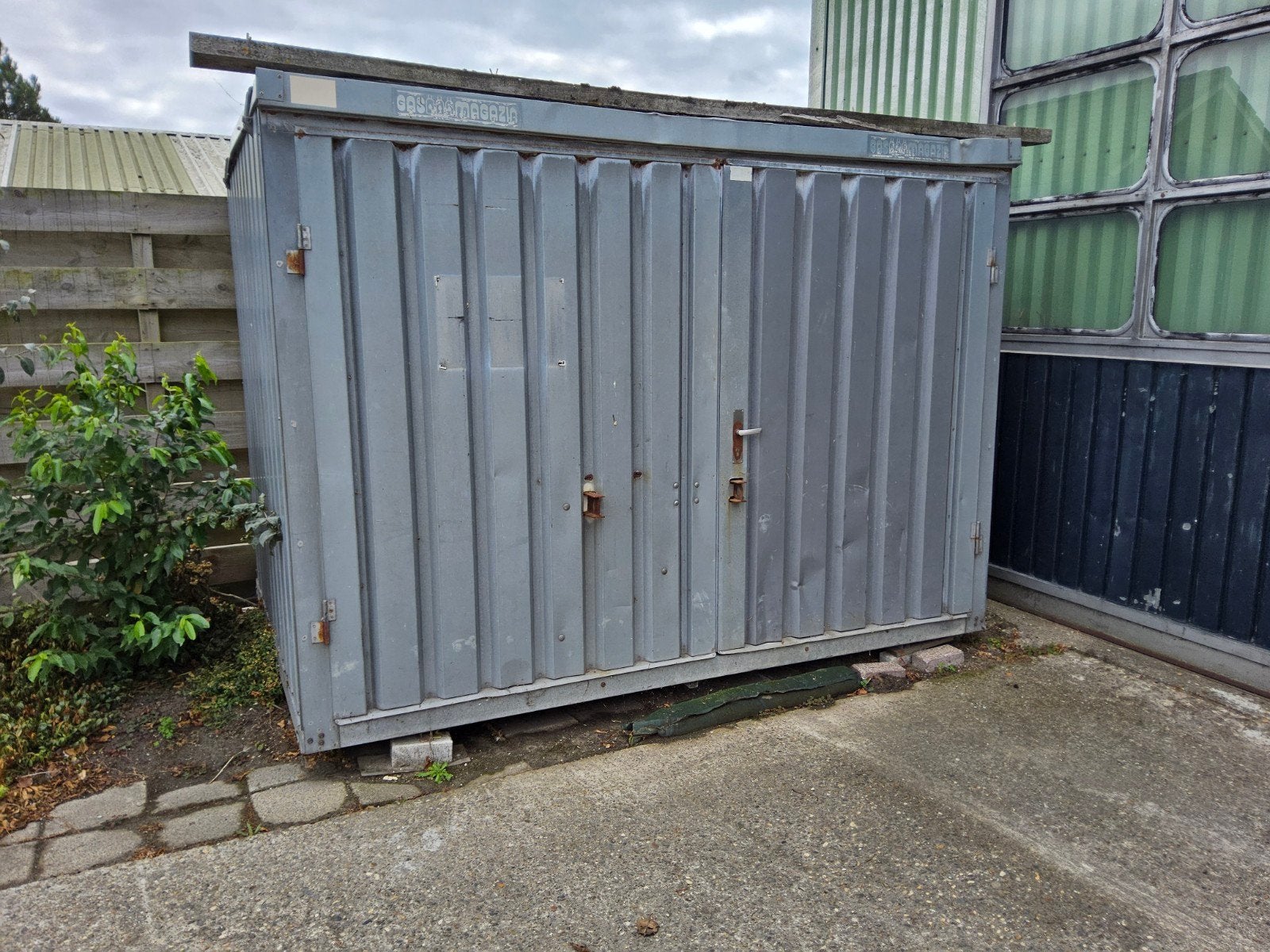 materiaalcontainer 3x2m, Ophalen