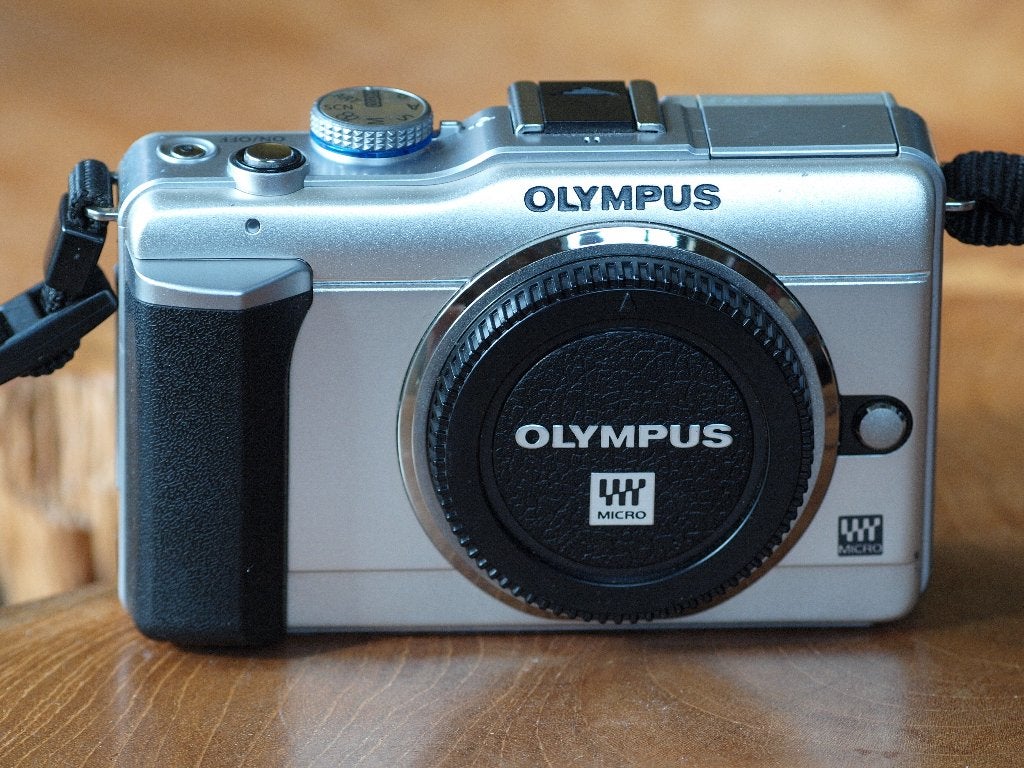 Olympus E-PL1 micro four thirds camera, Draagriem, Ophalen of Verzenden, Zo goed als nieuw, Olympus