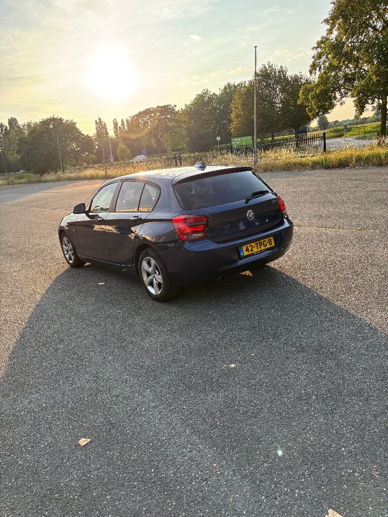 BMW 1-Serie 116I 100KW 5DR 2012 Blauw, Cruise Control, Airco, Euro 5, 4 cilinders, Blauw, Alcantara